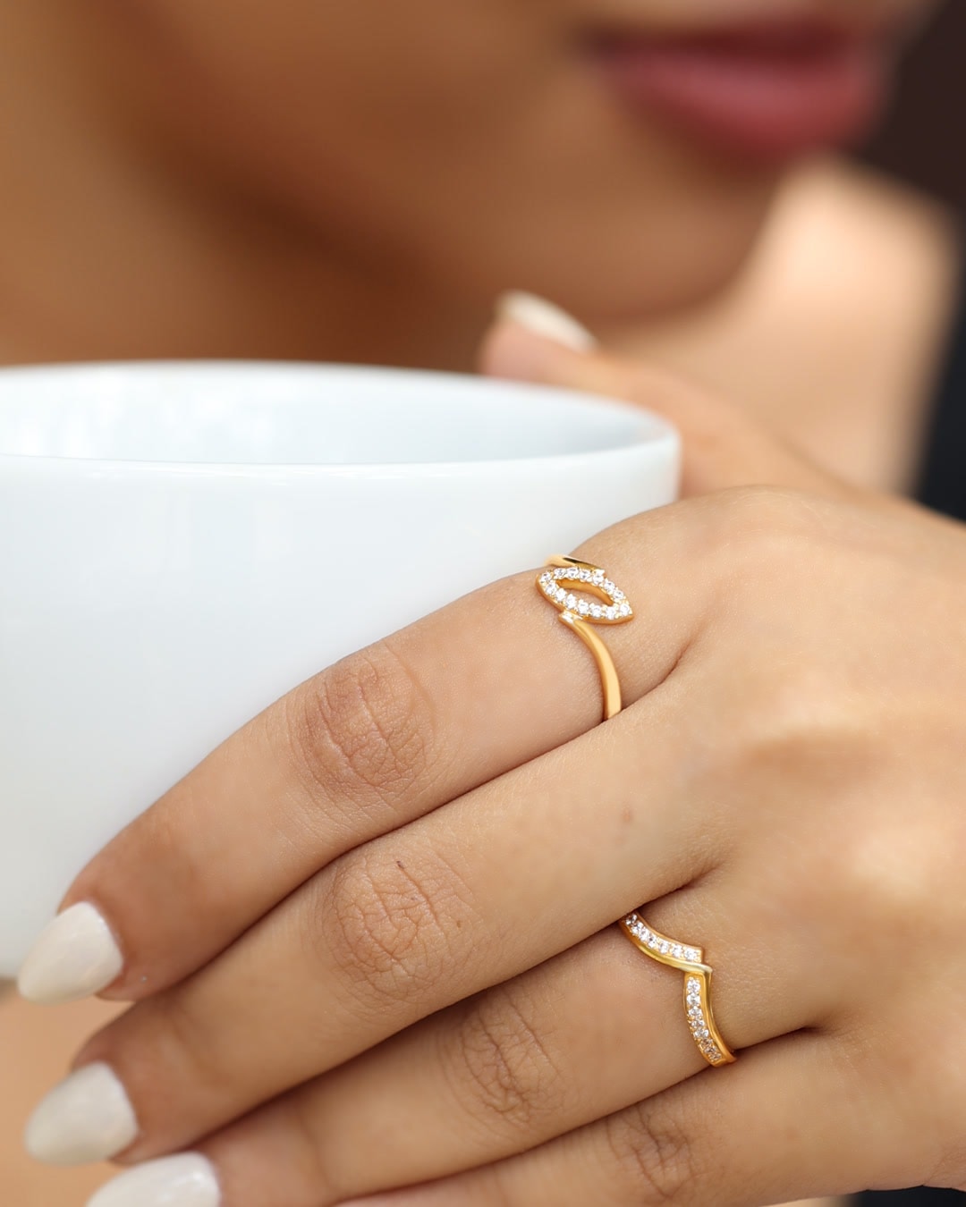 Gold rings set with sparkling stones
